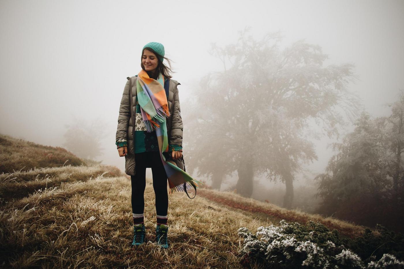 Young woman against a foggy background