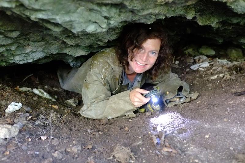 Researcher in a cave