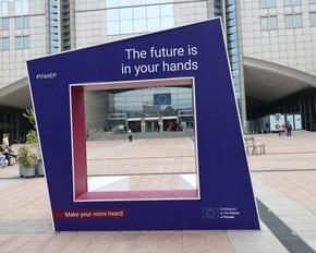 An installation in front of the EU Parliament with the inscription: "The future is in your hands. Make your voice heard."