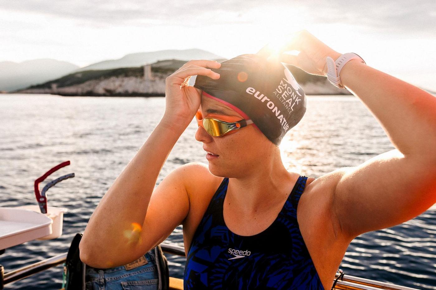 Open water swimmer arouses interest in the monk seal