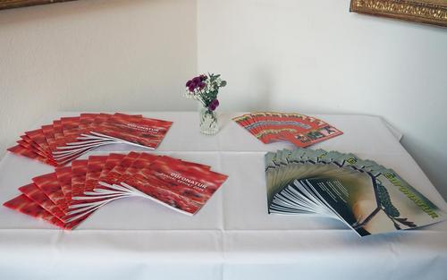 EuroNatur annual reports on a table with a white tablecloth