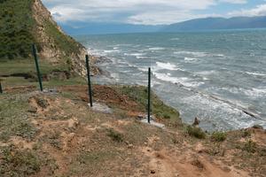 Construction fence blocks access to the sea