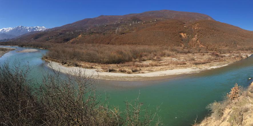Panorama of the river landscape on the Drin