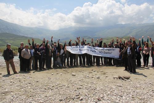 Participants of the event with a banner