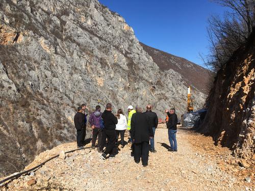 People visit construction site for dam