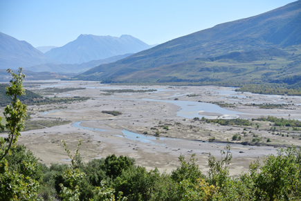 The Vjosa flows through a wide valley